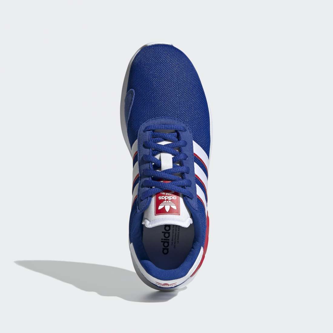ADIDAS LA TRAINER LITE J AZUREA/FTWBRA/ESCARL