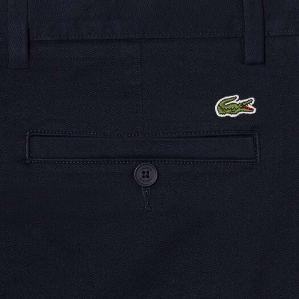 CALÇAS LACOSTE CHINO
